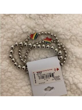Celebrate Together Pride themed silver beaded stretch bracelets